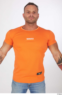 Garrott casual dressed orange t shirt upper body 0001.jpg